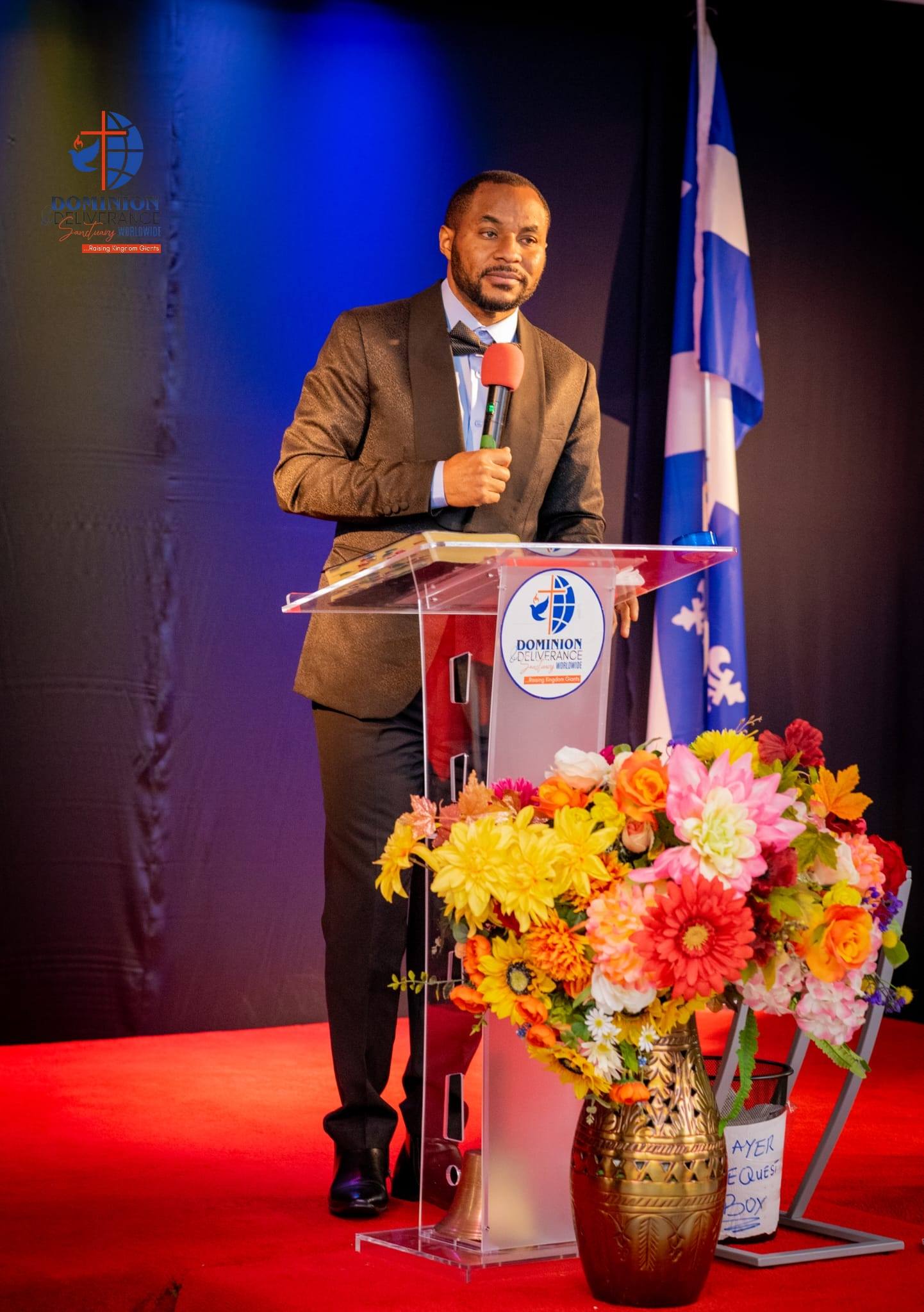 Pastor preaching at Dominion and Deliverance Sanctuary Worldwide